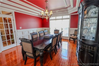 Welcome to this stunning 4 bed, 4 full bath custom home in the on Gates Four Golf and Country Club in North Carolina - for sale on GolfHomes.com, golf home, golf lot