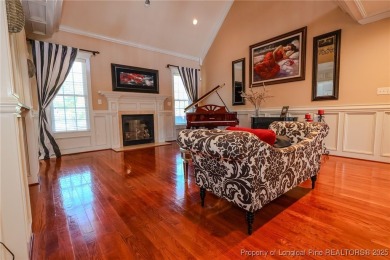 Welcome to this stunning 4 bed, 4 full bath custom home in the on Gates Four Golf and Country Club in North Carolina - for sale on GolfHomes.com, golf home, golf lot