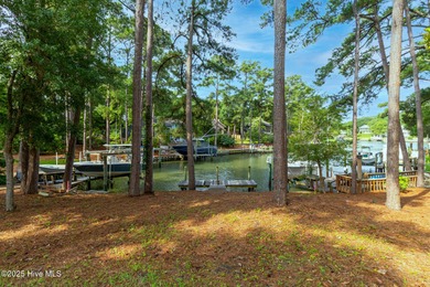 Discover the ultimate coastal lifestyle with this exceptional on The Country Club of the Crystal Coast in North Carolina - for sale on GolfHomes.com, golf home, golf lot