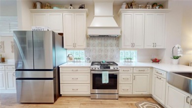 PRICE REDUCED!! LAKEFRONT LUXURY in Prestigious Bayou Club on Bayou Golf Club in Florida - for sale on GolfHomes.com, golf home, golf lot
