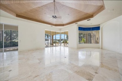 Sitting on a prime golf lake front lot, this custom estate on Quail West Golf and Country Club in Florida - for sale on GolfHomes.com, golf home, golf lot