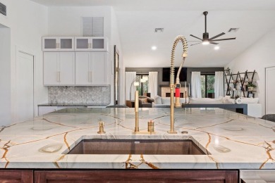 Welcome to this exquisitely renovated and designed 4-bedroom on Deer Creek Golf Club in Florida - for sale on GolfHomes.com, golf home, golf lot