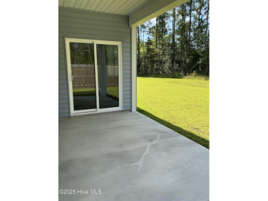 Like-New Coastal Retreat 
Step into coastal comfort with this on Lennon Hills Golf Course in North Carolina - for sale on GolfHomes.com, golf home, golf lot