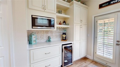 PRICE REDUCED!! LAKEFRONT LUXURY in Prestigious Bayou Club on Bayou Golf Club in Florida - for sale on GolfHomes.com, golf home, golf lot