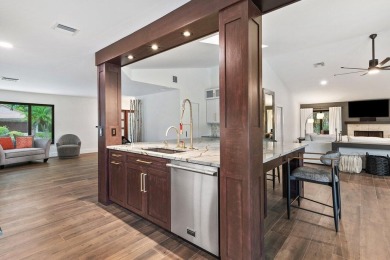 Welcome to this exquisitely renovated and designed 4-bedroom on Deer Creek Golf Club in Florida - for sale on GolfHomes.com, golf home, golf lot