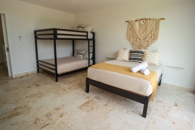 Beautiful 2-story home with 5 bedrooms, 6 bathrooms. Located in on Bahia Principe Riviera Maya Golf Course in  - for sale on GolfHomes.com, golf home, golf lot