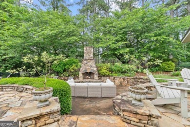 Tucked in the prestigious golf and lake community of Cuscowilla on The Golf Club at Cuscowilla in Georgia - for sale on GolfHomes.com, golf home, golf lot