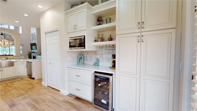 PRICE REDUCED!! LAKEFRONT LUXURY in Prestigious Bayou Club on Bayou Golf Club in Florida - for sale on GolfHomes.com, golf home, golf lot