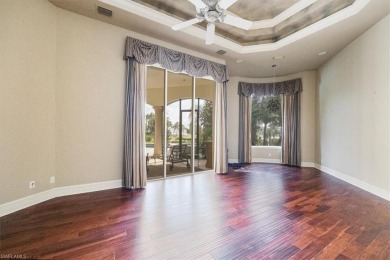 Sitting on a prime golf lake front lot, this custom estate on Quail West Golf and Country Club in Florida - for sale on GolfHomes.com, golf home, golf lot