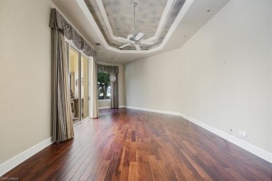 Sitting on a prime golf lake front lot, this custom estate on Quail West Golf and Country Club in Florida - for sale on GolfHomes.com, golf home, golf lot