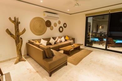 Beautiful 2-story home with 5 bedrooms, 6 bathrooms. Located in on Bahia Principe Riviera Maya Golf Course in  - for sale on GolfHomes.com, golf home, golf lot