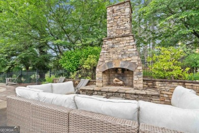 Tucked in the prestigious golf and lake community of Cuscowilla on The Golf Club at Cuscowilla in Georgia - for sale on GolfHomes.com, golf home, golf lot