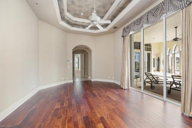 Sitting on a prime golf lake front lot, this custom estate on Quail West Golf and Country Club in Florida - for sale on GolfHomes.com, golf home, golf lot