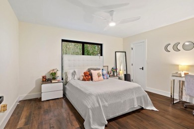 Welcome to this exquisitely renovated and designed 4-bedroom on Deer Creek Golf Club in Florida - for sale on GolfHomes.com, golf home, golf lot