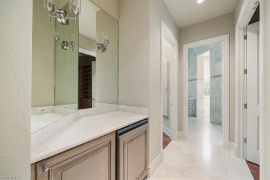Sitting on a prime golf lake front lot, this custom estate on Quail West Golf and Country Club in Florida - for sale on GolfHomes.com, golf home, golf lot