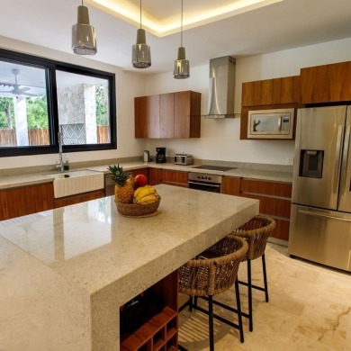 Beautiful 2-story home with 5 bedrooms, 6 bathrooms. Located in on Bahia Principe Riviera Maya Golf Course in  - for sale on GolfHomes.com, golf home, golf lot