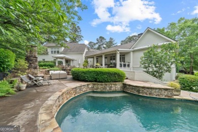 Tucked in the prestigious golf and lake community of Cuscowilla on The Golf Club at Cuscowilla in Georgia - for sale on GolfHomes.com, golf home, golf lot
