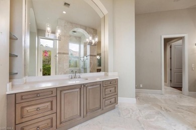 Sitting on a prime golf lake front lot, this custom estate on Quail West Golf and Country Club in Florida - for sale on GolfHomes.com, golf home, golf lot