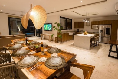 Beautiful 2-story home with 5 bedrooms, 6 bathrooms. Located in on Bahia Principe Riviera Maya Golf Course in  - for sale on GolfHomes.com, golf home, golf lot