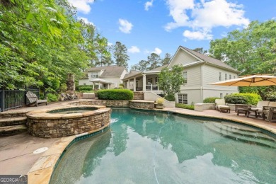 Tucked in the prestigious golf and lake community of Cuscowilla on The Golf Club at Cuscowilla in Georgia - for sale on GolfHomes.com, golf home, golf lot