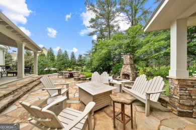 Tucked in the prestigious golf and lake community of Cuscowilla on The Golf Club at Cuscowilla in Georgia - for sale on GolfHomes.com, golf home, golf lot