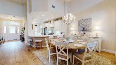 PRICE REDUCED!! LAKEFRONT LUXURY in Prestigious Bayou Club on Bayou Golf Club in Florida - for sale on GolfHomes.com, golf home, golf lot