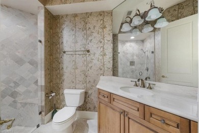 Sitting on a prime golf lake front lot, this custom estate on Quail West Golf and Country Club in Florida - for sale on GolfHomes.com, golf home, golf lot