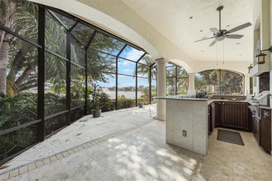 Sitting on a prime golf lake front lot, this custom estate on Quail West Golf and Country Club in Florida - for sale on GolfHomes.com, golf home, golf lot