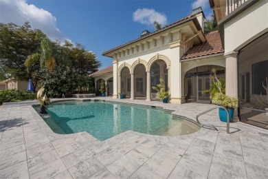 Sitting on a prime golf lake front lot, this custom estate on Quail West Golf and Country Club in Florida - for sale on GolfHomes.com, golf home, golf lot