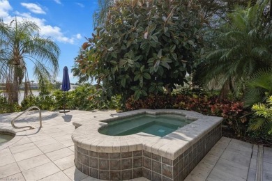 Sitting on a prime golf lake front lot, this custom estate on Quail West Golf and Country Club in Florida - for sale on GolfHomes.com, golf home, golf lot