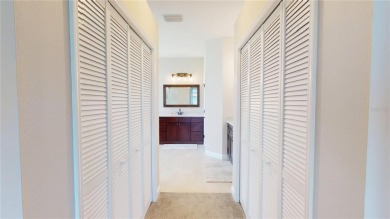 PRICE REDUCED!! LAKEFRONT LUXURY in Prestigious Bayou Club on Bayou Golf Club in Florida - for sale on GolfHomes.com, golf home, golf lot