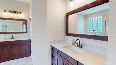 PRICE REDUCED!! LAKEFRONT LUXURY in Prestigious Bayou Club on Bayou Golf Club in Florida - for sale on GolfHomes.com, golf home, golf lot