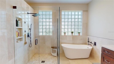 PRICE REDUCED!! LAKEFRONT LUXURY in Prestigious Bayou Club on Bayou Golf Club in Florida - for sale on GolfHomes.com, golf home, golf lot
