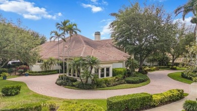 Sitting on a prime golf lake front lot, this custom estate on Quail West Golf and Country Club in Florida - for sale on GolfHomes.com, golf home, golf lot