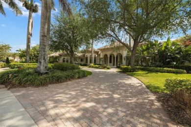 Sitting on a prime golf lake front lot, this custom estate on Quail West Golf and Country Club in Florida - for sale on GolfHomes.com, golf home, golf lot