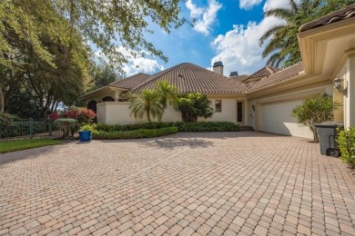 Sitting on a prime golf lake front lot, this custom estate on Quail West Golf and Country Club in Florida - for sale on GolfHomes.com, golf home, golf lot