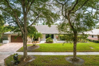 Welcome to this exquisitely renovated and designed 4-bedroom on Deer Creek Golf Club in Florida - for sale on GolfHomes.com, golf home, golf lot