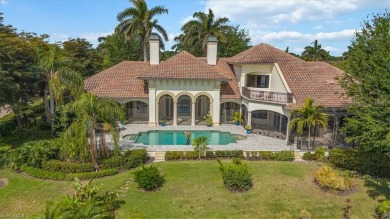 Sitting on a prime golf lake front lot, this custom estate on Quail West Golf and Country Club in Florida - for sale on GolfHomes.com, golf home, golf lot