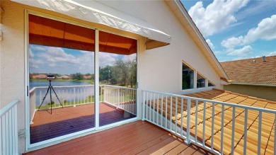 PRICE REDUCED!! LAKEFRONT LUXURY in Prestigious Bayou Club on Bayou Golf Club in Florida - for sale on GolfHomes.com, golf home, golf lot