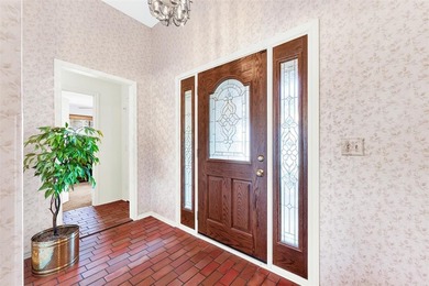 Enjoy beautiful curb appeal, directly across from 58 acre on Sherrill Park Golf Course in Texas - for sale on GolfHomes.com, golf home, golf lot