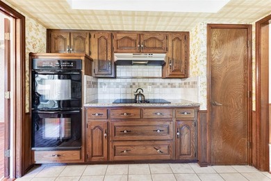 Enjoy beautiful curb appeal, directly across from 58 acre on Sherrill Park Golf Course in Texas - for sale on GolfHomes.com, golf home, golf lot