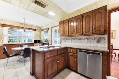 Enjoy beautiful curb appeal, directly across from 58 acre on Sherrill Park Golf Course in Texas - for sale on GolfHomes.com, golf home, golf lot