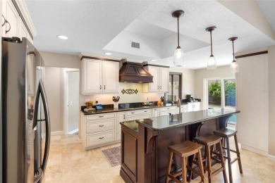 Impeccably Redesigned Pool Home in Coveted Winter Park on Winter Pines Golf Club in Florida - for sale on GolfHomes.com, golf home, golf lot
