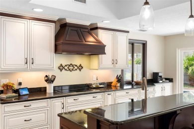 Impeccably Redesigned Pool Home in Coveted Winter Park on Winter Pines Golf Club in Florida - for sale on GolfHomes.com, golf home, golf lot