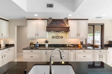 Impeccably Redesigned Pool Home in Coveted Winter Park on Winter Pines Golf Club in Florida - for sale on GolfHomes.com, golf home, golf lot