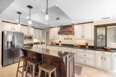Impeccably Redesigned Pool Home in Coveted Winter Park on Winter Pines Golf Club in Florida - for sale on GolfHomes.com, golf home, golf lot