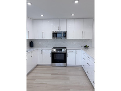 Step into refined luxury in this remodeled Bobby Jones model, a on Gleneagles Golf and Country Club in Florida - for sale on GolfHomes.com, golf home, golf lot