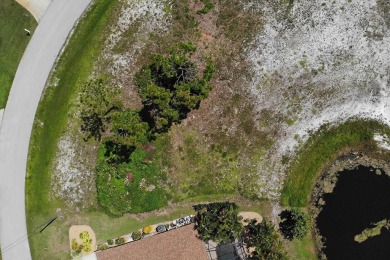 This stunning WATERFRONT lot is located in the golf community of on Rotonda Golf and Country Club - Long Marsh  in Florida - for sale on GolfHomes.com, golf home, golf lot