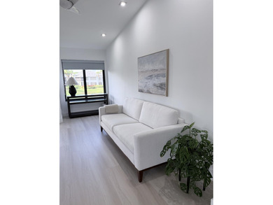 Step into refined luxury in this remodeled Bobby Jones model, a on Gleneagles Golf and Country Club in Florida - for sale on GolfHomes.com, golf home, golf lot