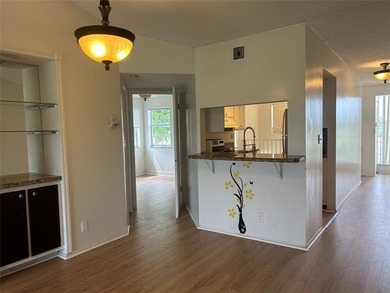 Stunning 2 Bedroom, 2 Bath Corner Unit in Breezes at Palm Aire! on Palm-Aire Country Club and Resort - Palms in Florida - for sale on GolfHomes.com, golf home, golf lot